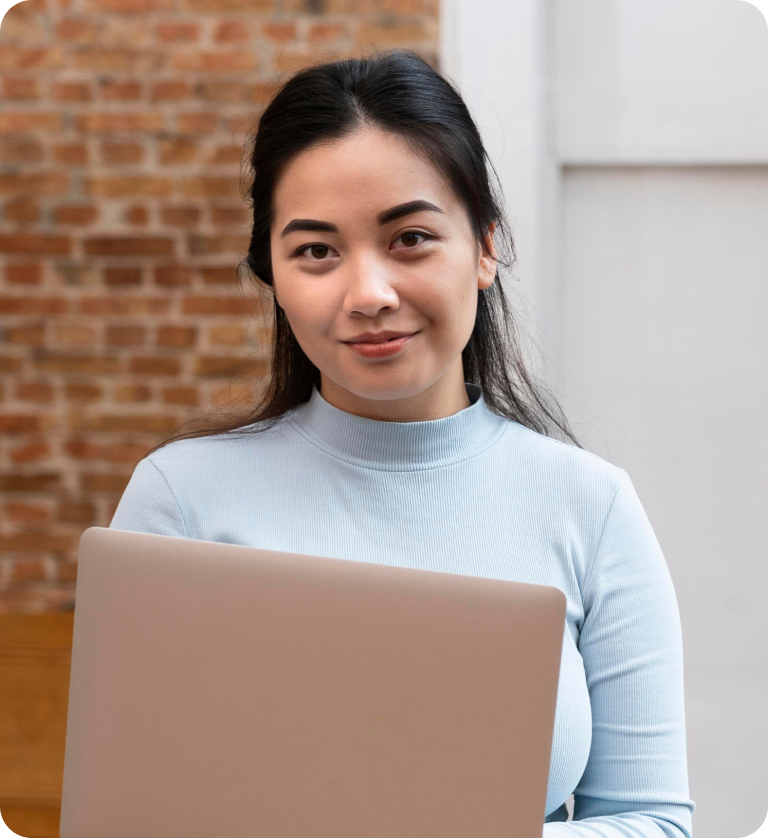 Pepper Cloud team member working on a laptop